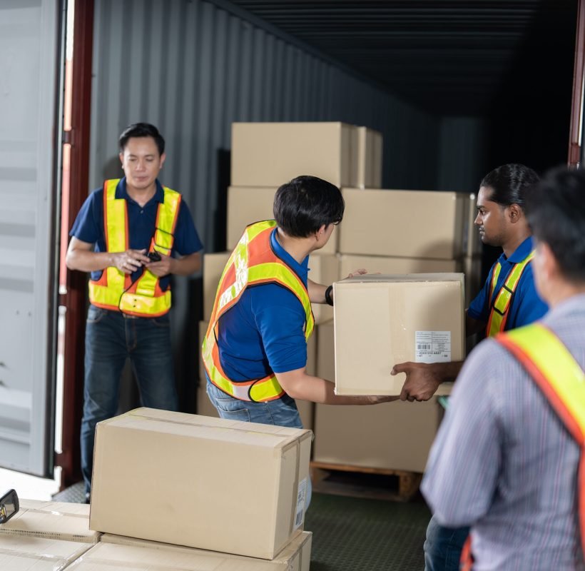 Workers open steel 40 feet container doors carry box supervisor standing check paper checklist Workers open steel 40 feet container doors carry box supervisor standing check paper checklist